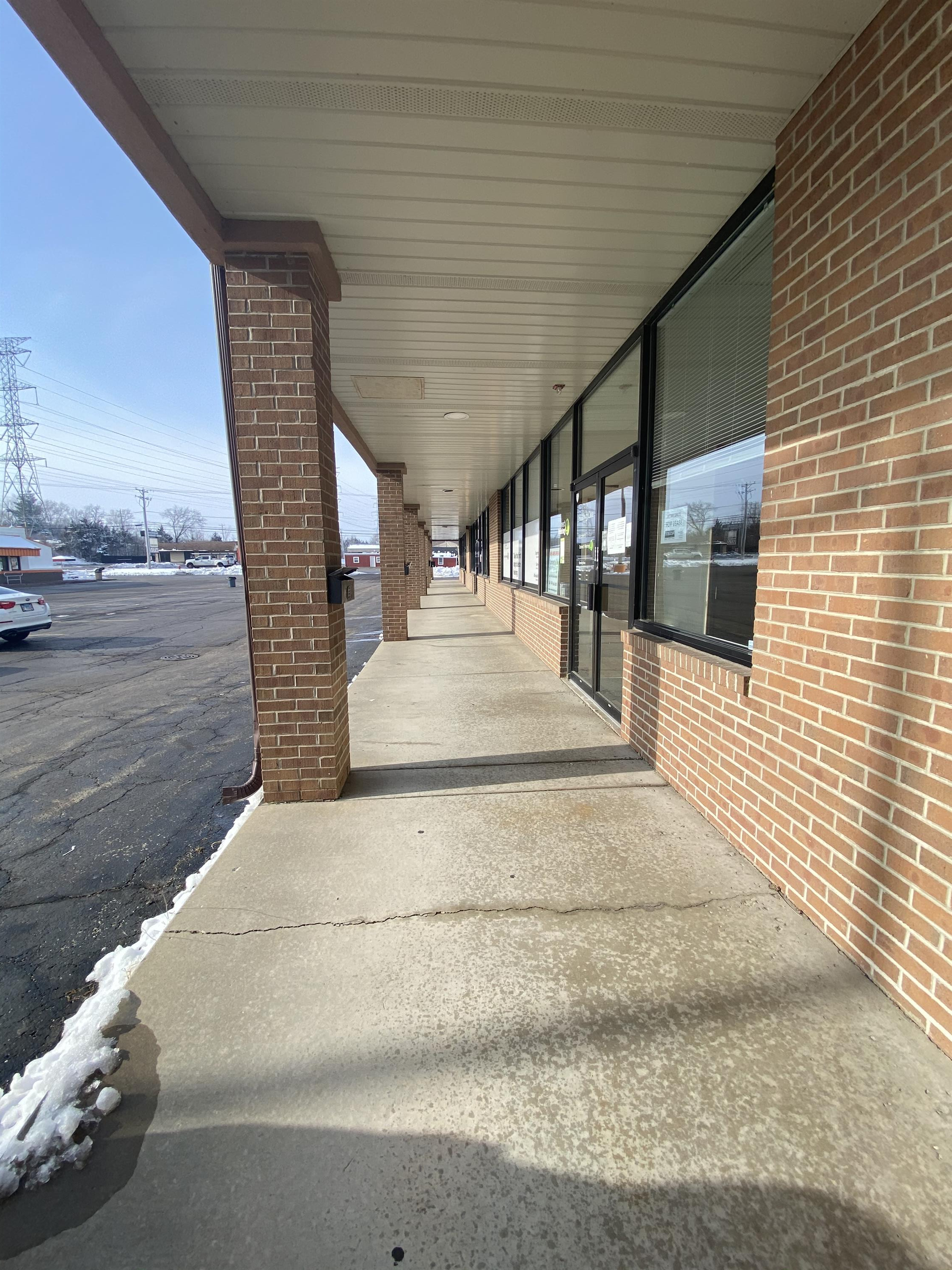 North Aurora Shopping Center Suite 3 - A